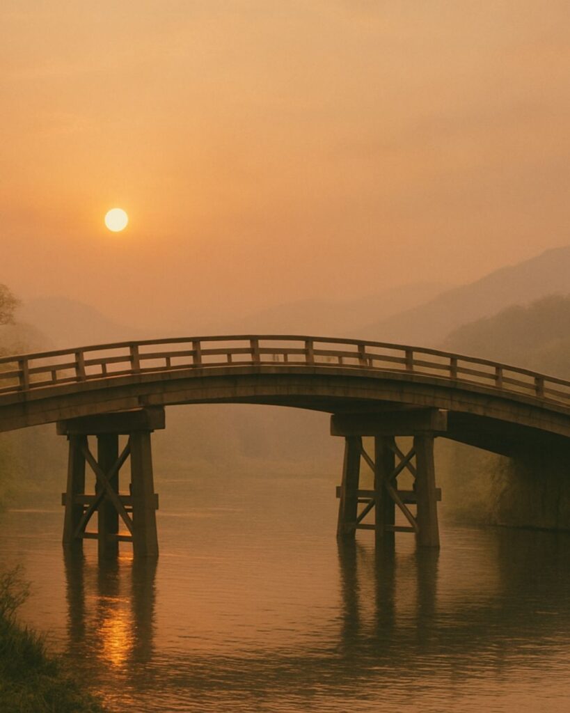 立花北枝の春の俳句5選-自然に寄り添う情景「橋桁や 日はさしながら ゆふがすみ」この俳句をイメージした画像