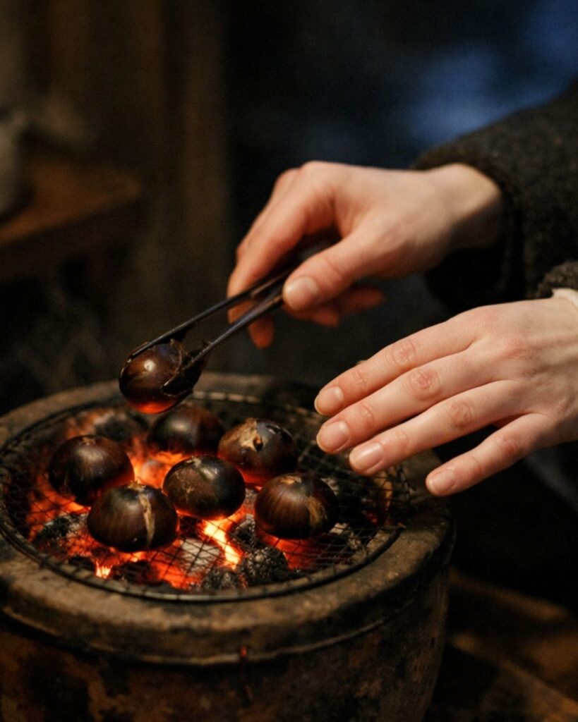 島木赤彦の冬の短歌5選-代表作をわかりやすく解説！「夜寒の手 栗を焼きたる 真白き手 さびしかりし手 うれしかりし手」この短歌をイメージした画像